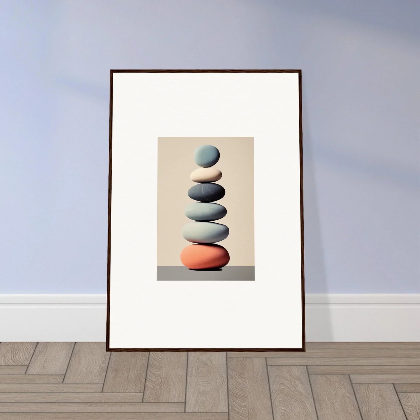 Framed canvas print of balanced stones with blue pebble for stylish room decoration