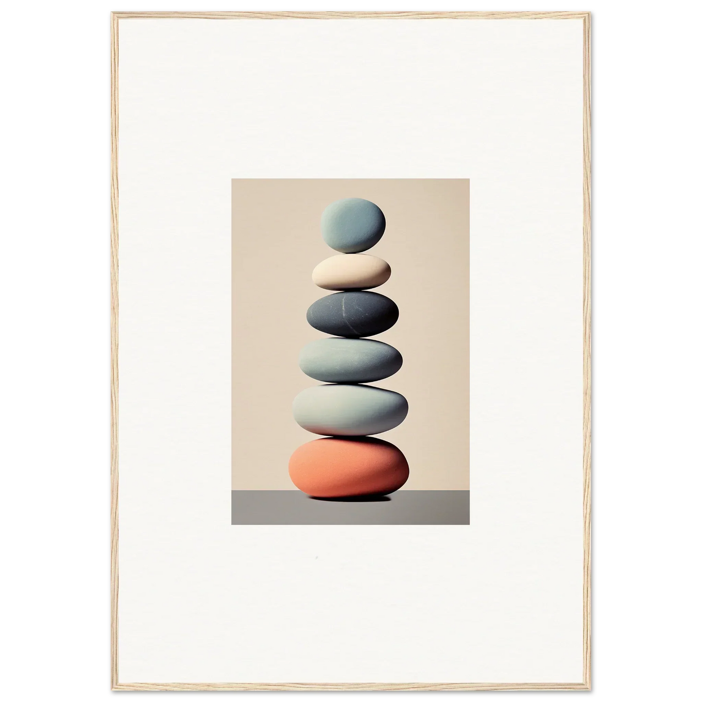 Stack of smooth, balanced stones in shades of blue, gray, and orange for room decoration