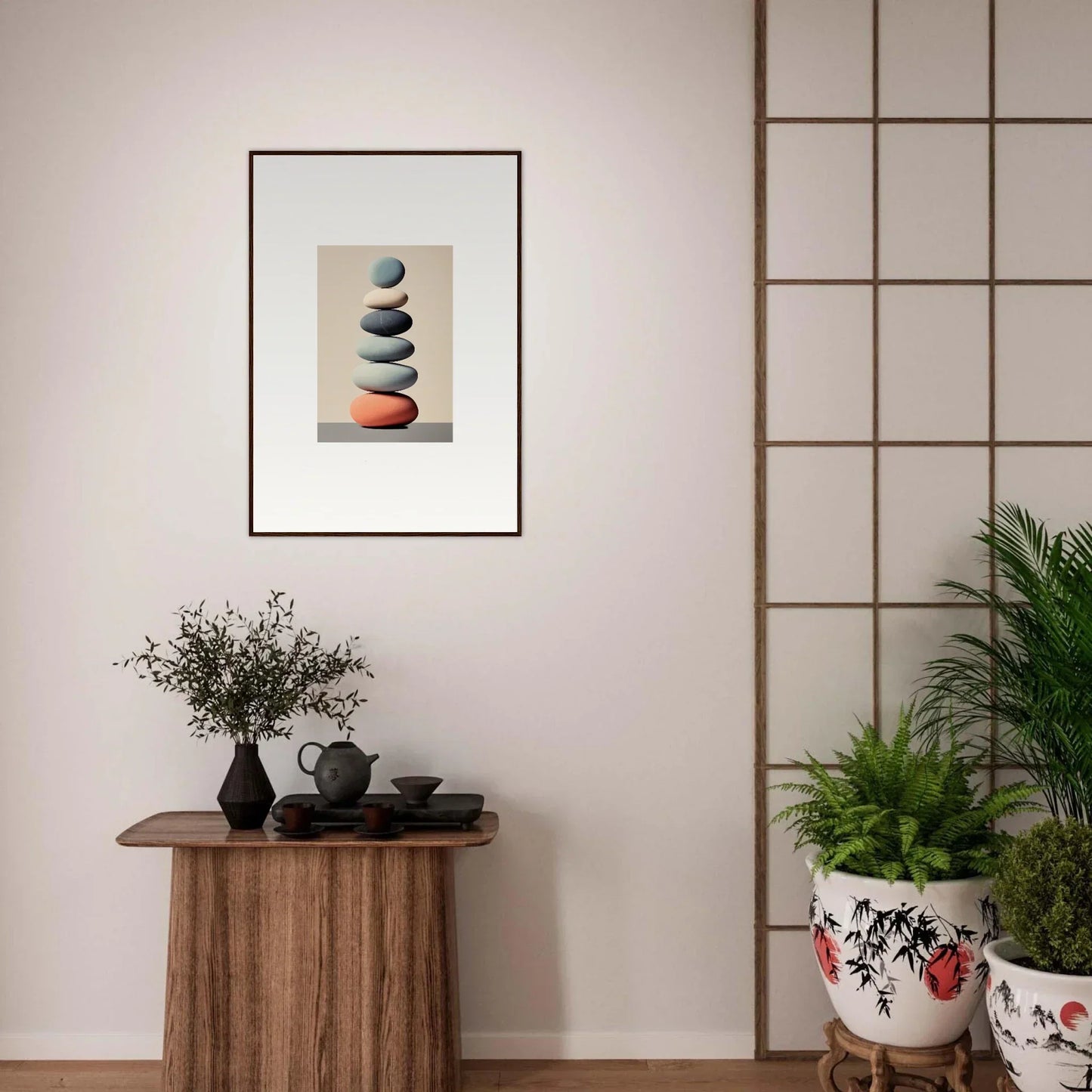 Framed canvas print of stacked stones, featuring a red one at the base for room decoration