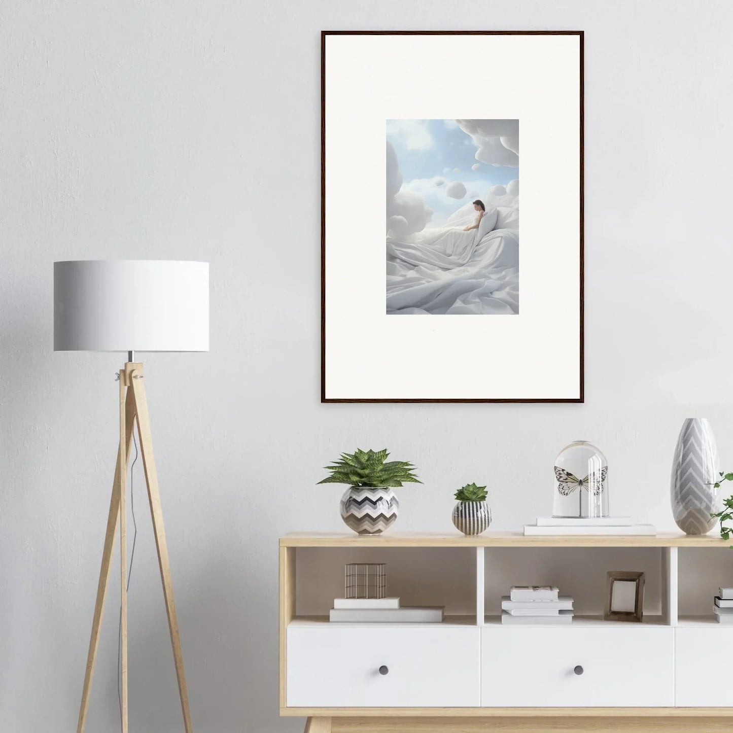 Framed wall art of a figure in white fabric for serene cotton dream room decor