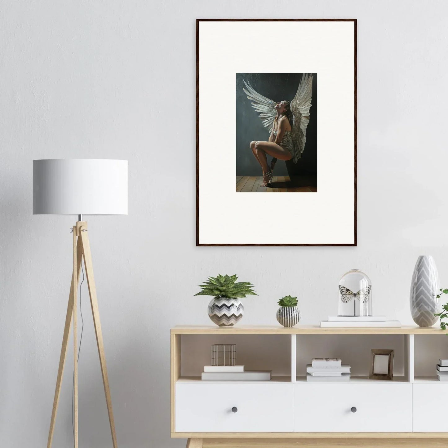 Framed artwork of a winged figure in deep thought from Heavenly Weakened Psalms