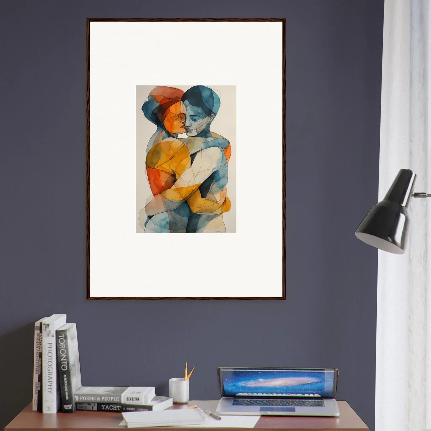 Framed abstract canvas print of colorful figures embracing for perfect room decoration