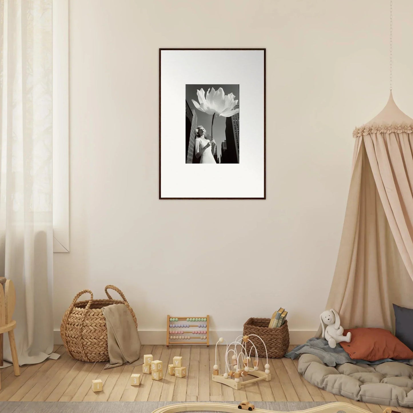 Framed black and white photo of a person with a large flower for bloom reverie room decoration