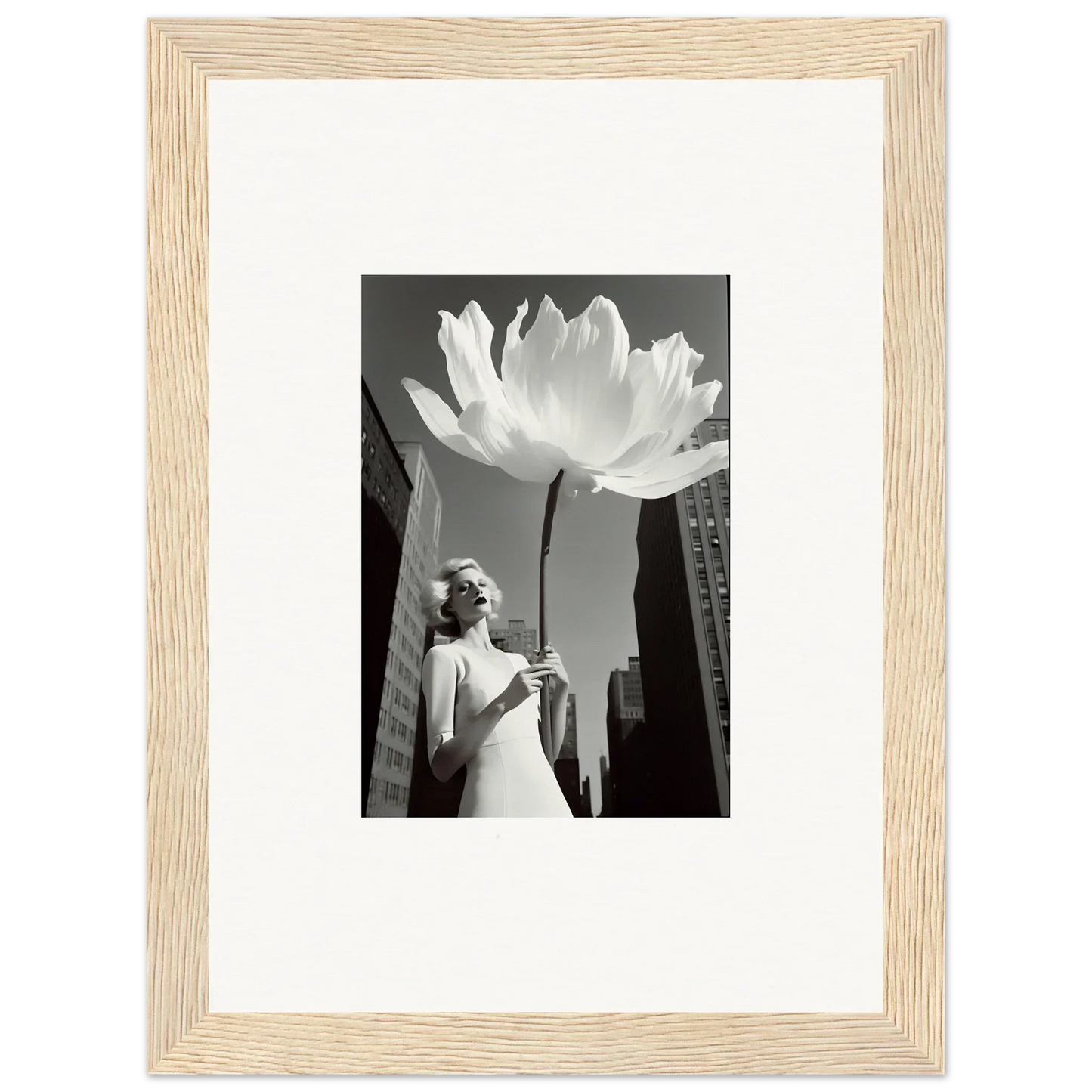 Framed black and white canvas print of a giant flower over a cityscape, perfect for room decoration