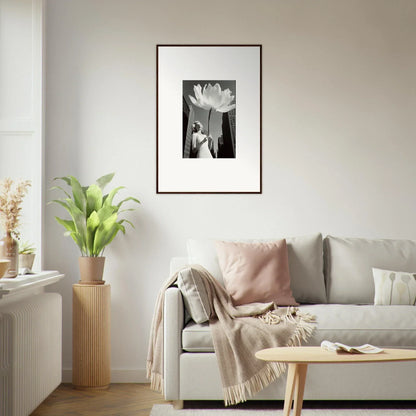 Framed black and white photo of a person and a large flower for bloom reverie room decoration