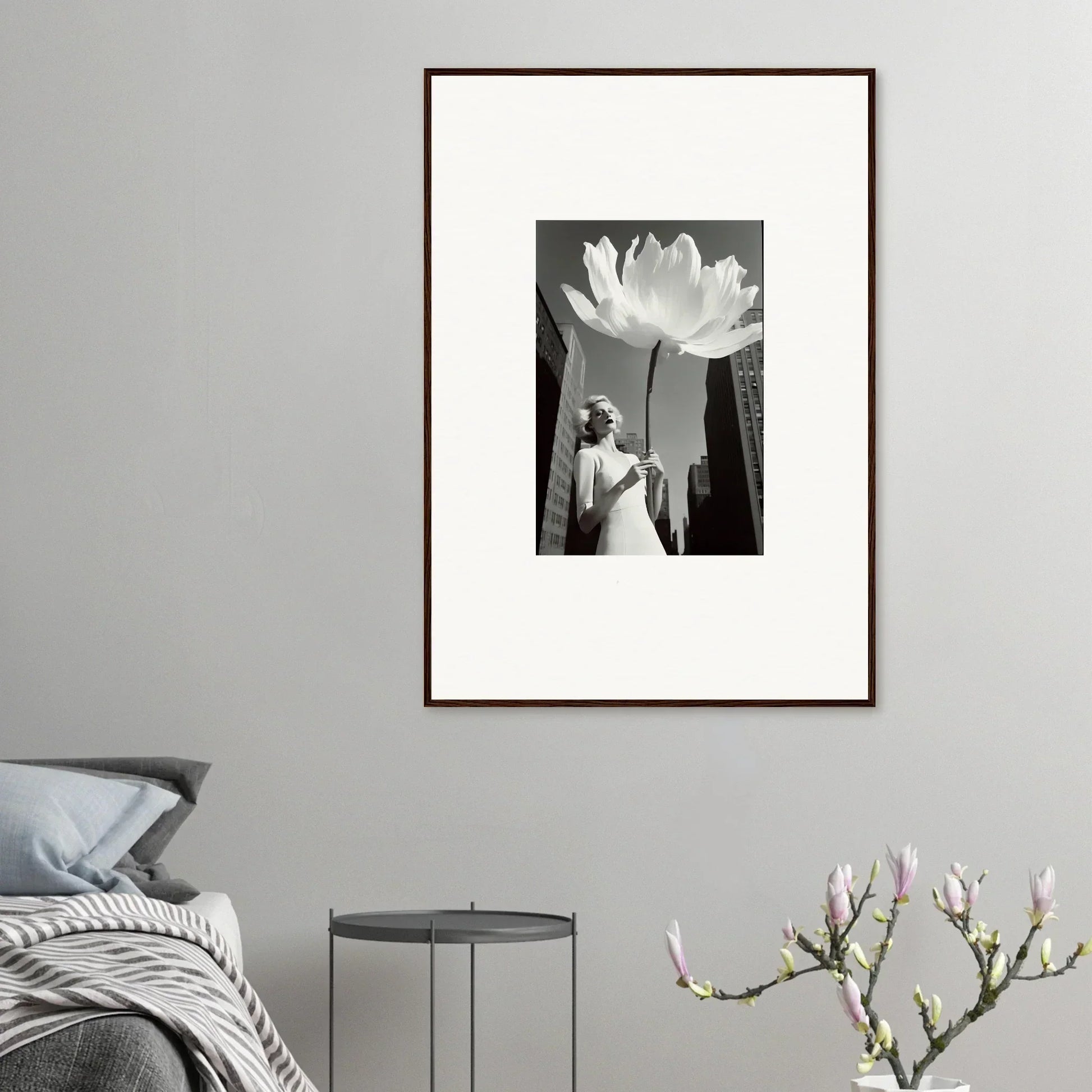 Framed black and white canvas print of a person under a giant flower for bloom reverie room decoration