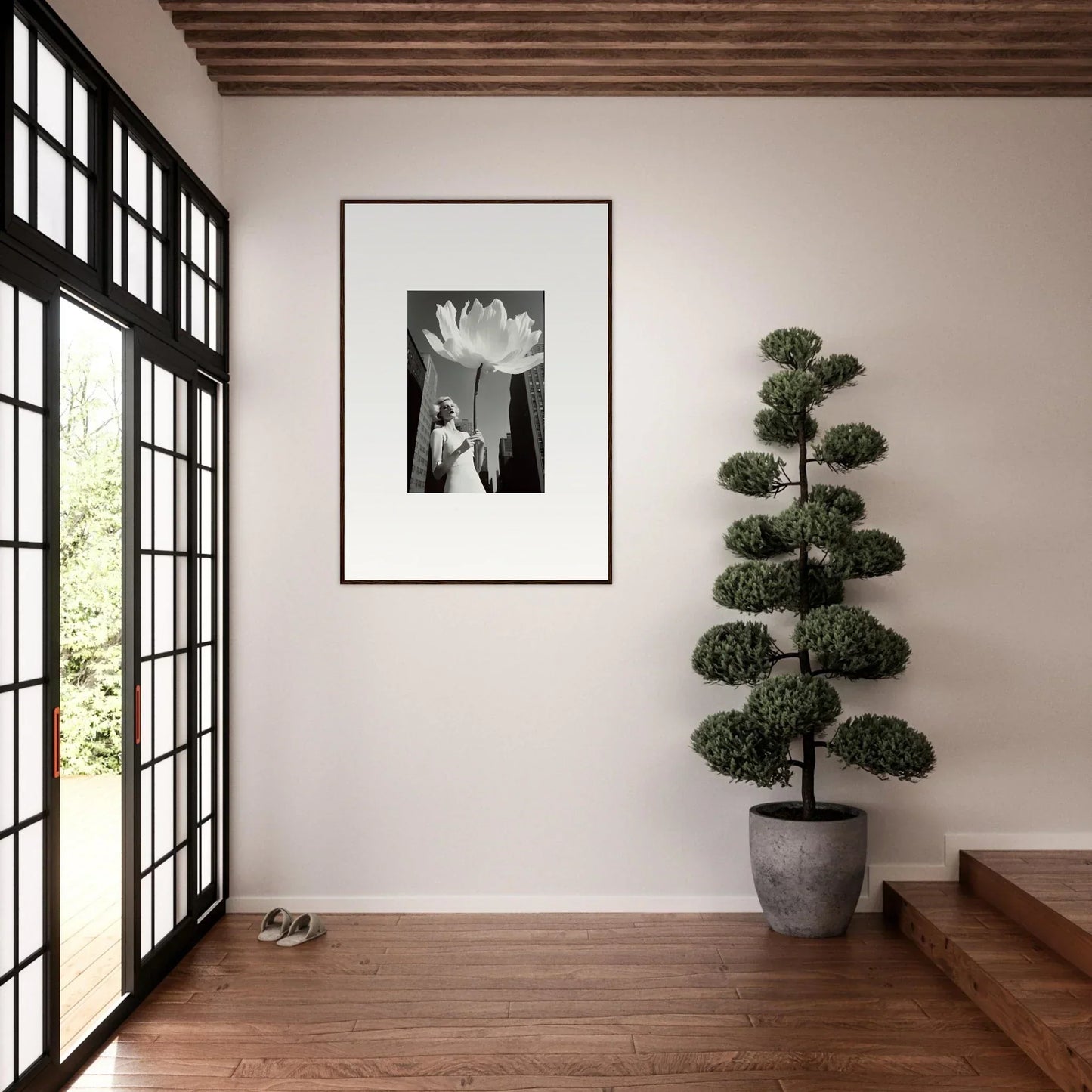 Framed black and white photograph of a person with a large flower for bloom reverie room decoration