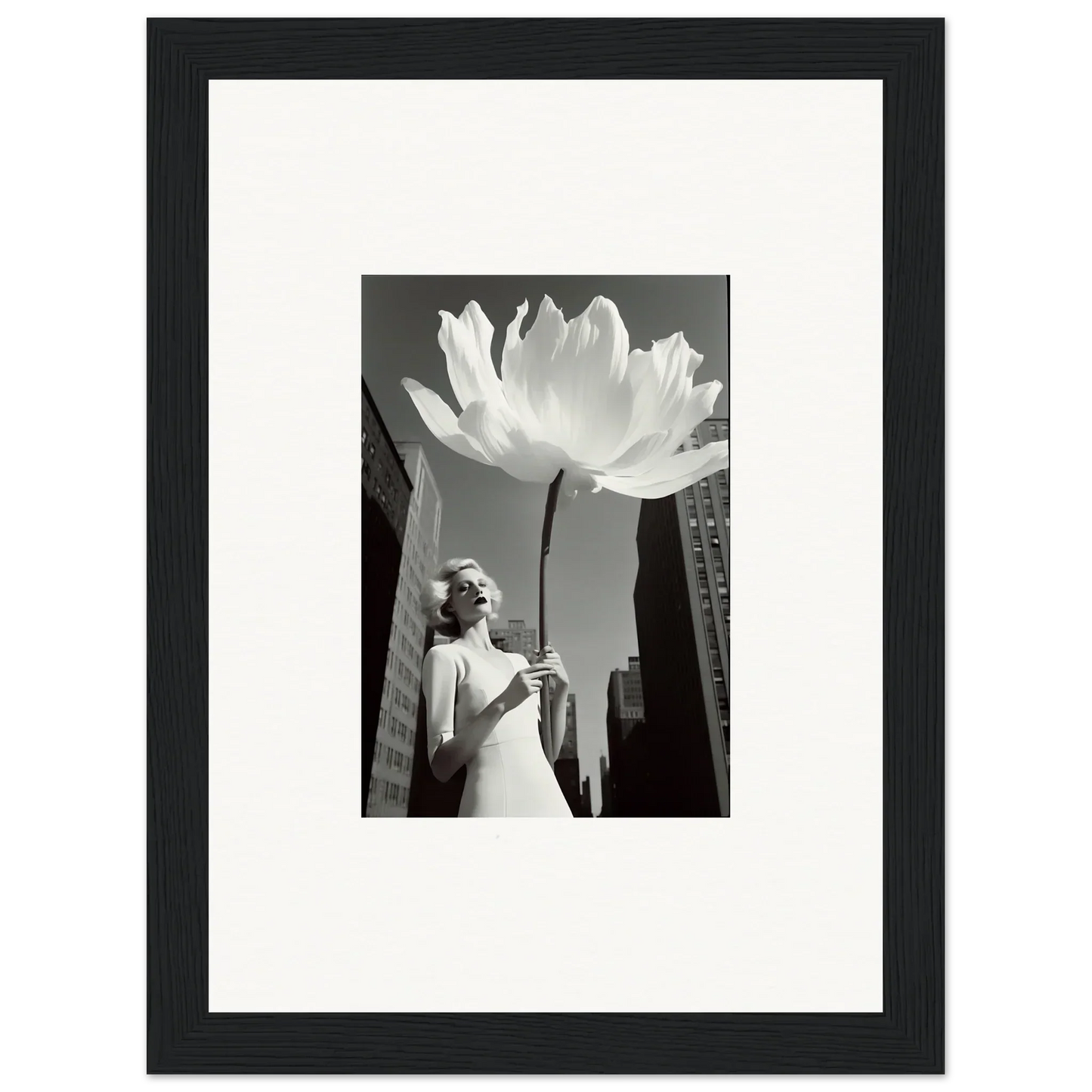 Black and white photo of a woman with a big lotus for an urban bloom reverie canvas print