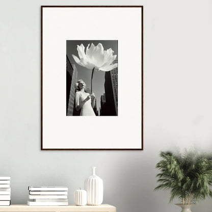 Framed black and white photo of a person with a giant flower for bloom reverie room decoration