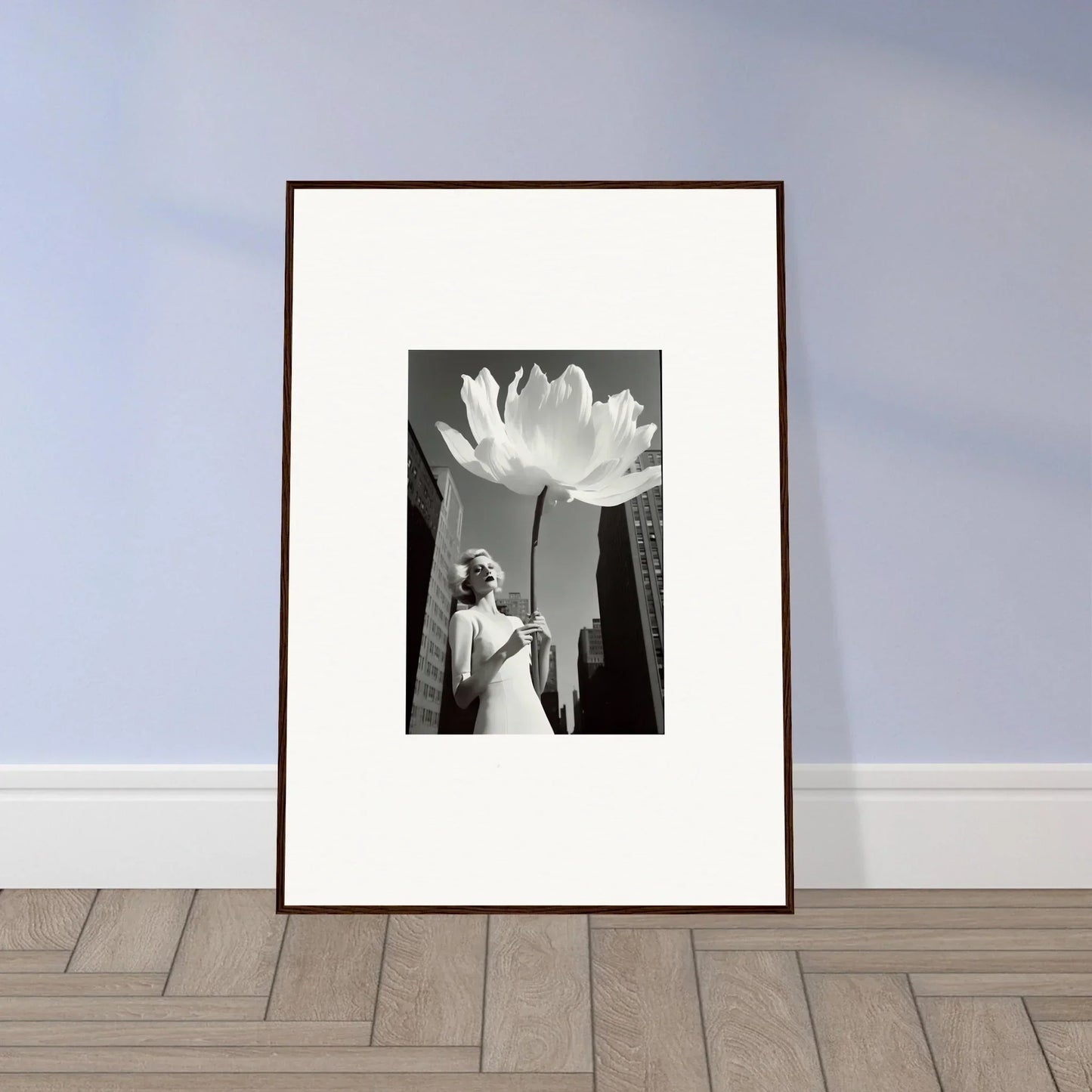 Framed black and white canvas print of a person under a giant lotus for room decoration