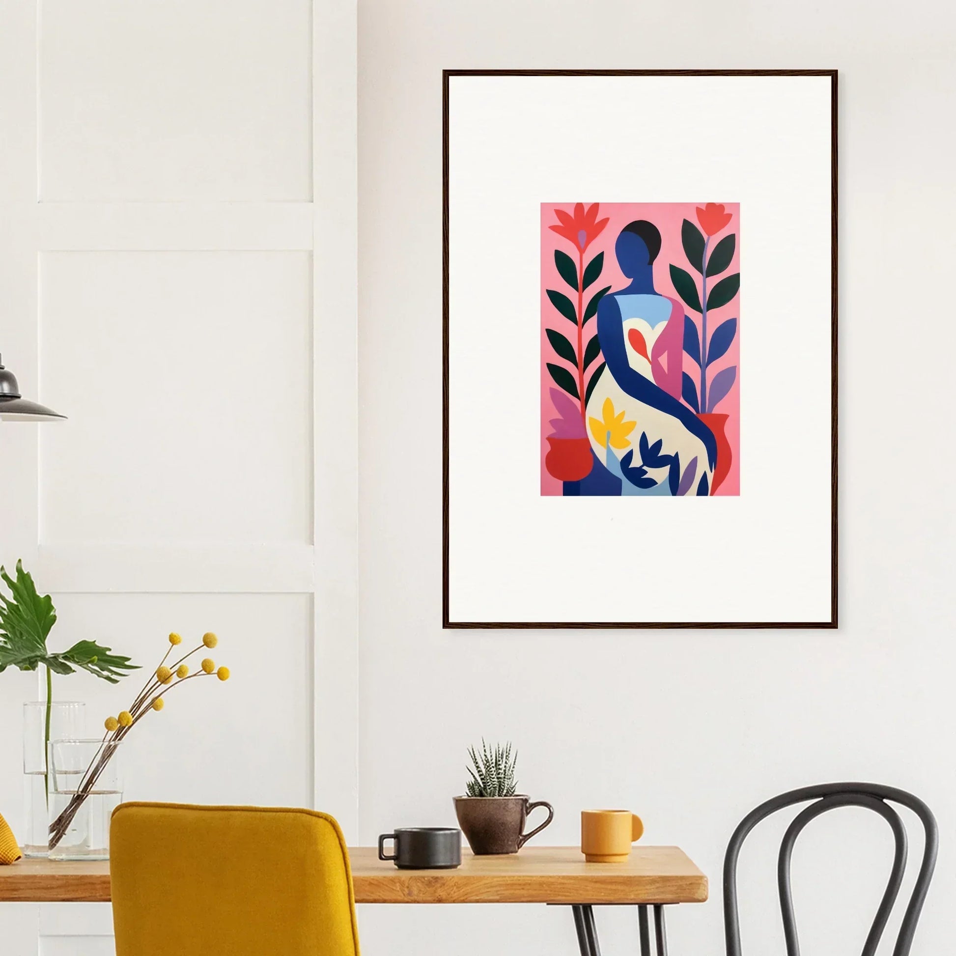 Framed abstract canvas print of colorful shapes and a human figure for room decoration