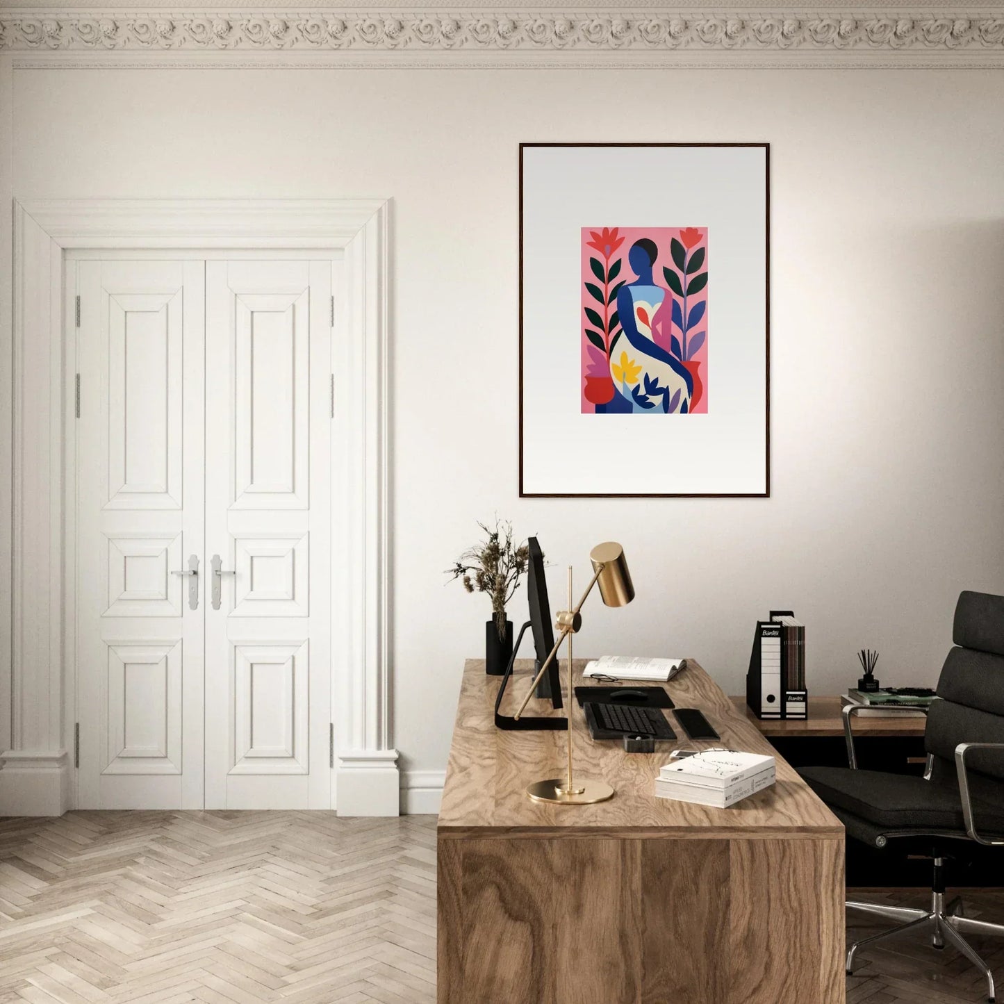 Stylish home office with a wooden desk and colorful canvas print for a Succulent Dream vibe