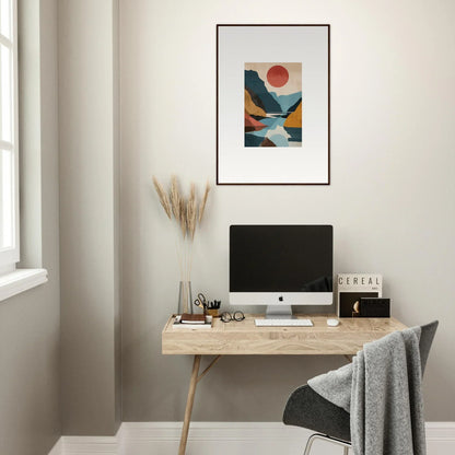 Minimalist home office with wooden desk, computer, and Horizon Echoes canvas print