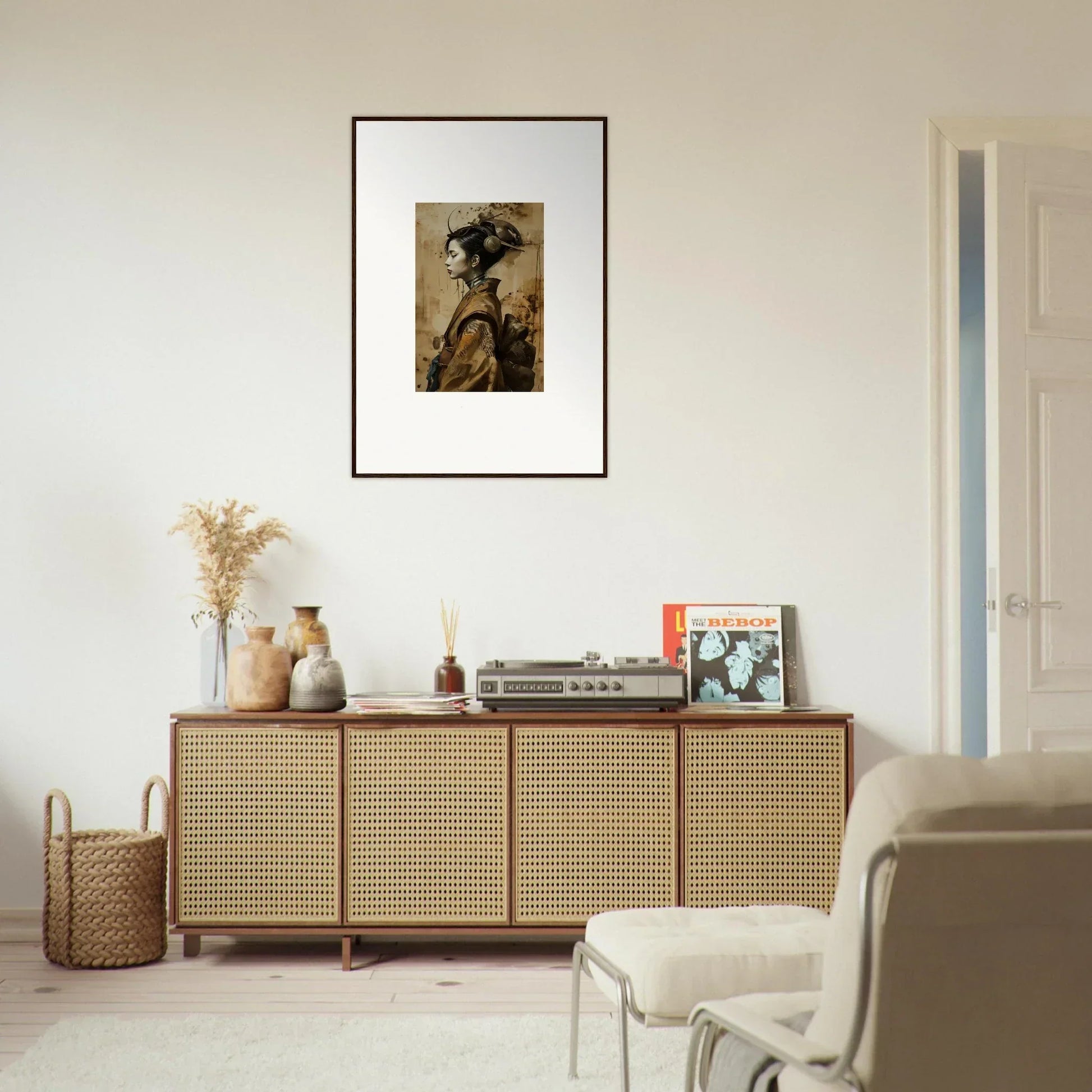 Wooden sideboard with cane-webbed doors and geisha shadowed canvas print on top