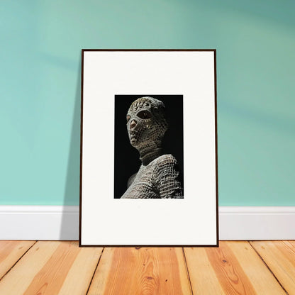 Framed black and white photograph of a sculptural bust.