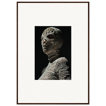 Ancient stone sculpture of a humanoid figure with textured, patterned skin.