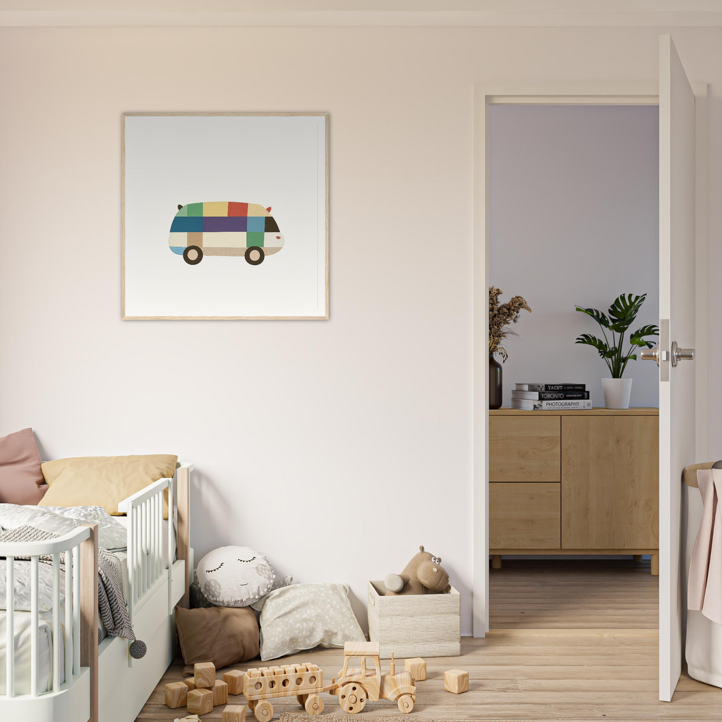 Framed illustration of a colorful camper van from Joyful Block Voyage on a white wall