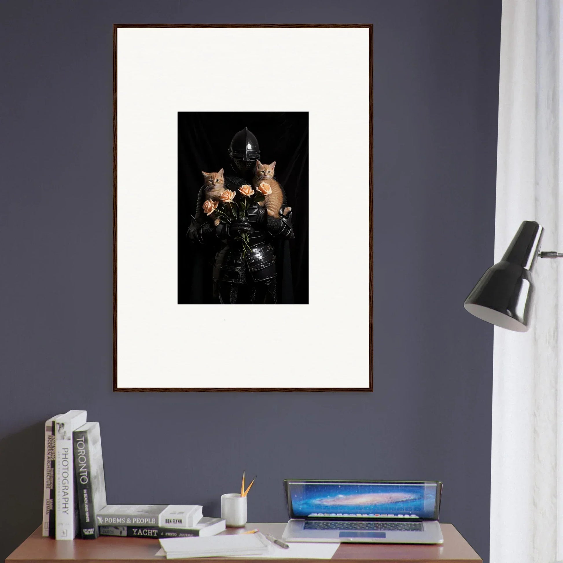 Framed wall art of a person in dark clothing with two cats, floral epiphany theme