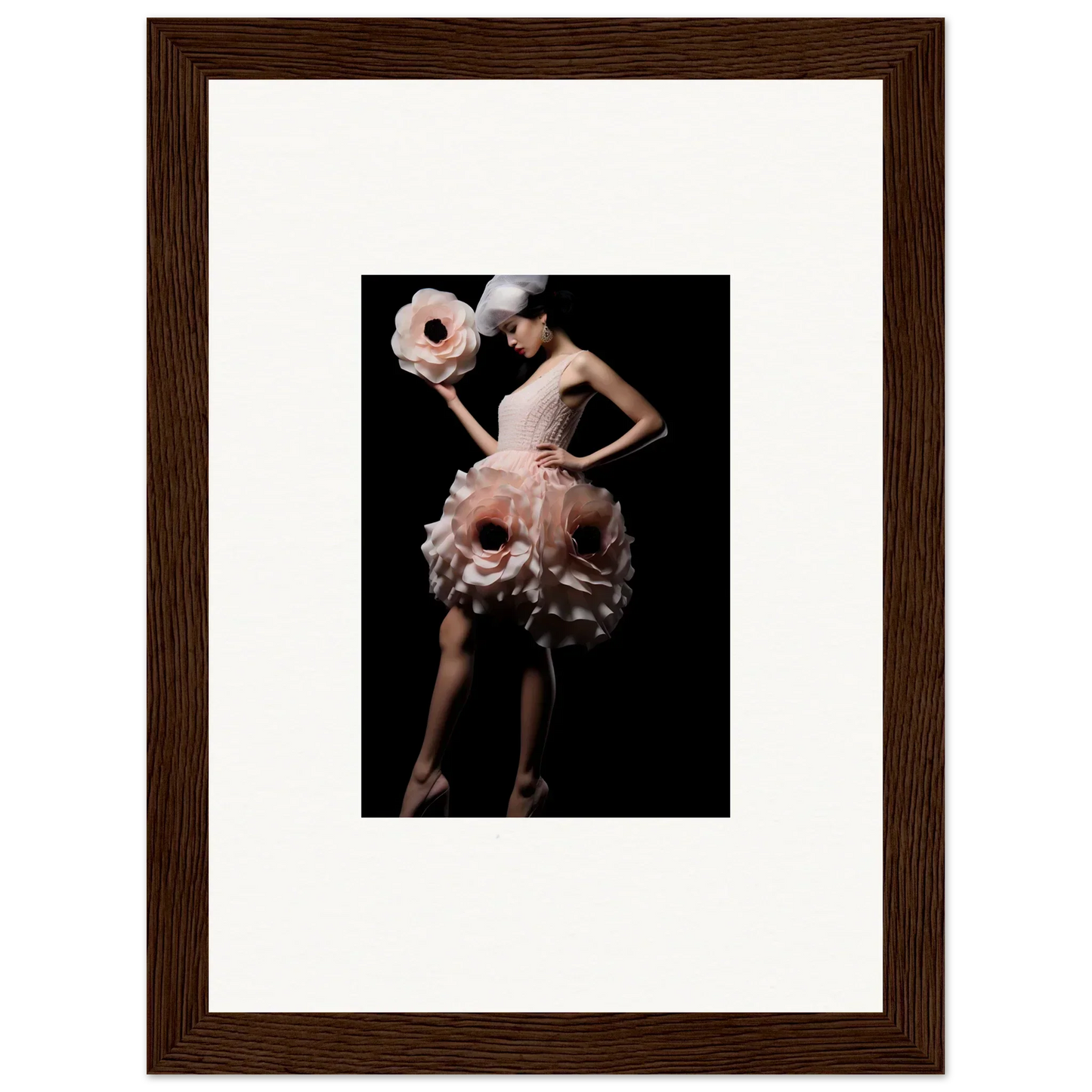 Framed wall art of a model in a pink ruffled dress for stylish room decor