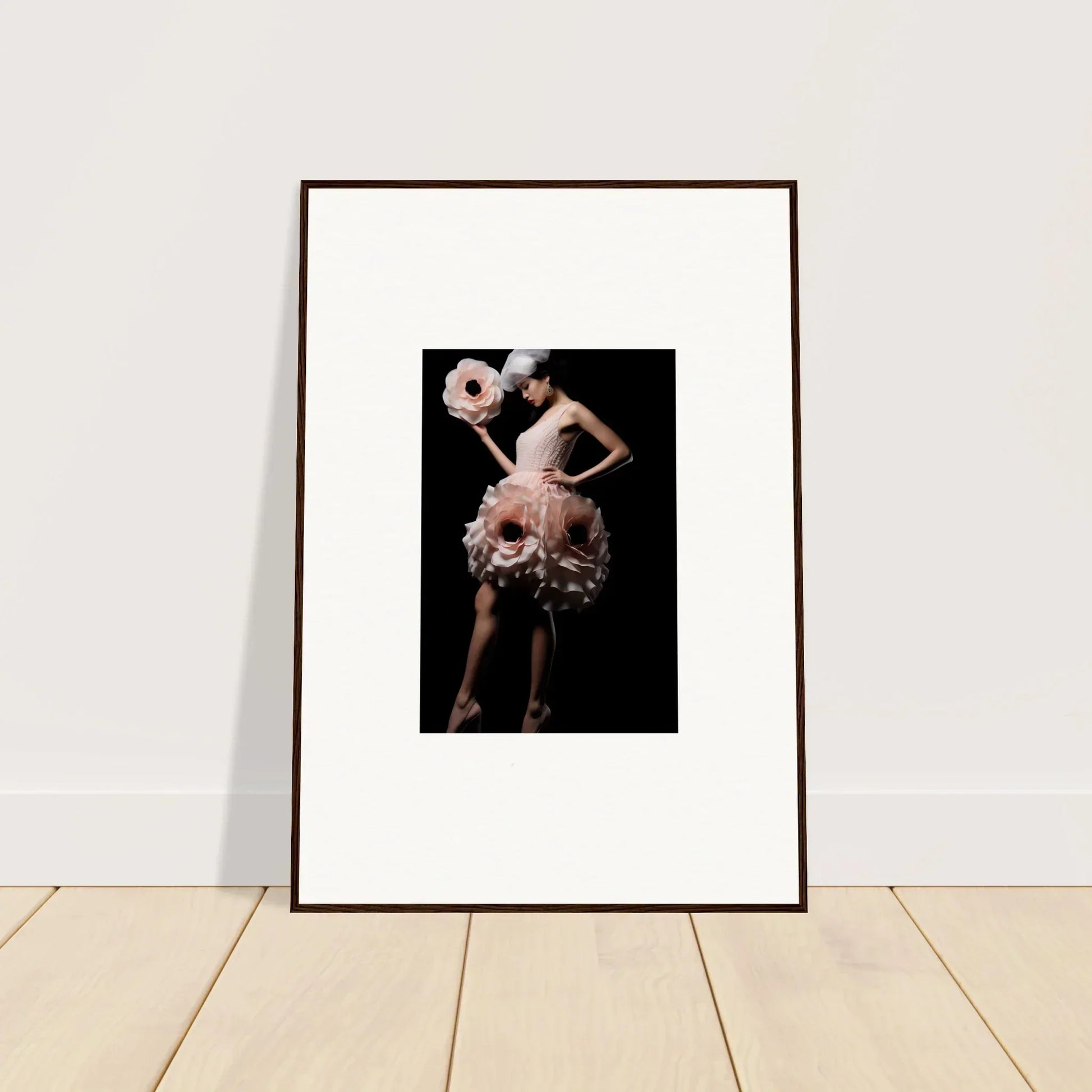 Framed wall art of a person in a pink tulle costume for unique room decor