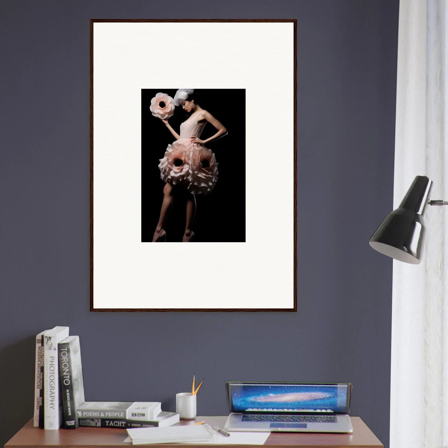 Framed wall art of a figure in avant-garde costume with spherical elements for room decor