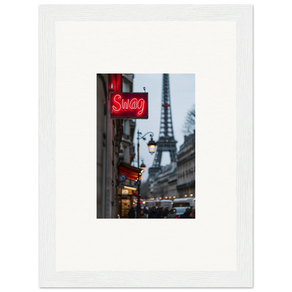 Framed wall art of a Parisian street with neon Swag sign and Eiffel Tower, perfect for room decor