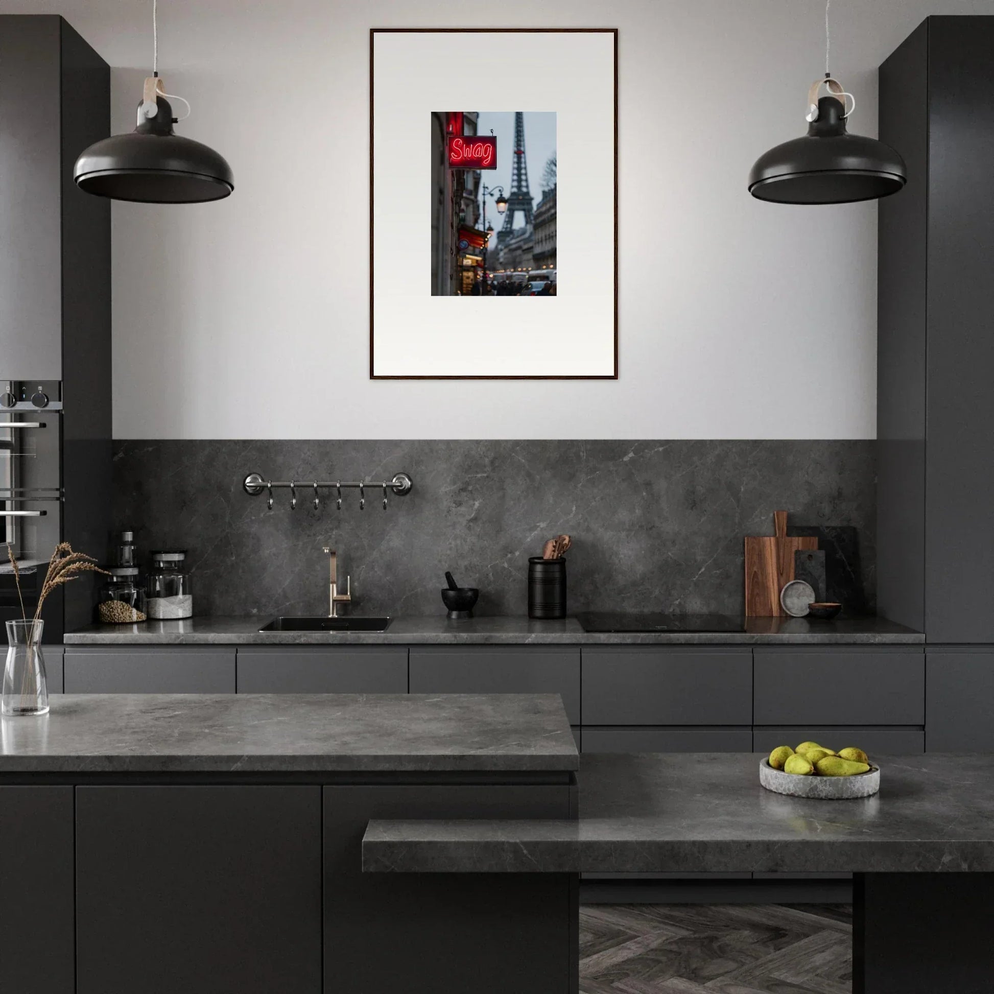 Modern kitchen with dark gray cabinetry and framed wall art for stylish room decor