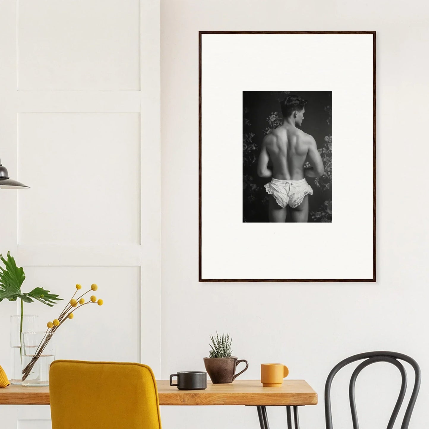 Framed black and white canvas print of a person’s bare back for chic room decoration