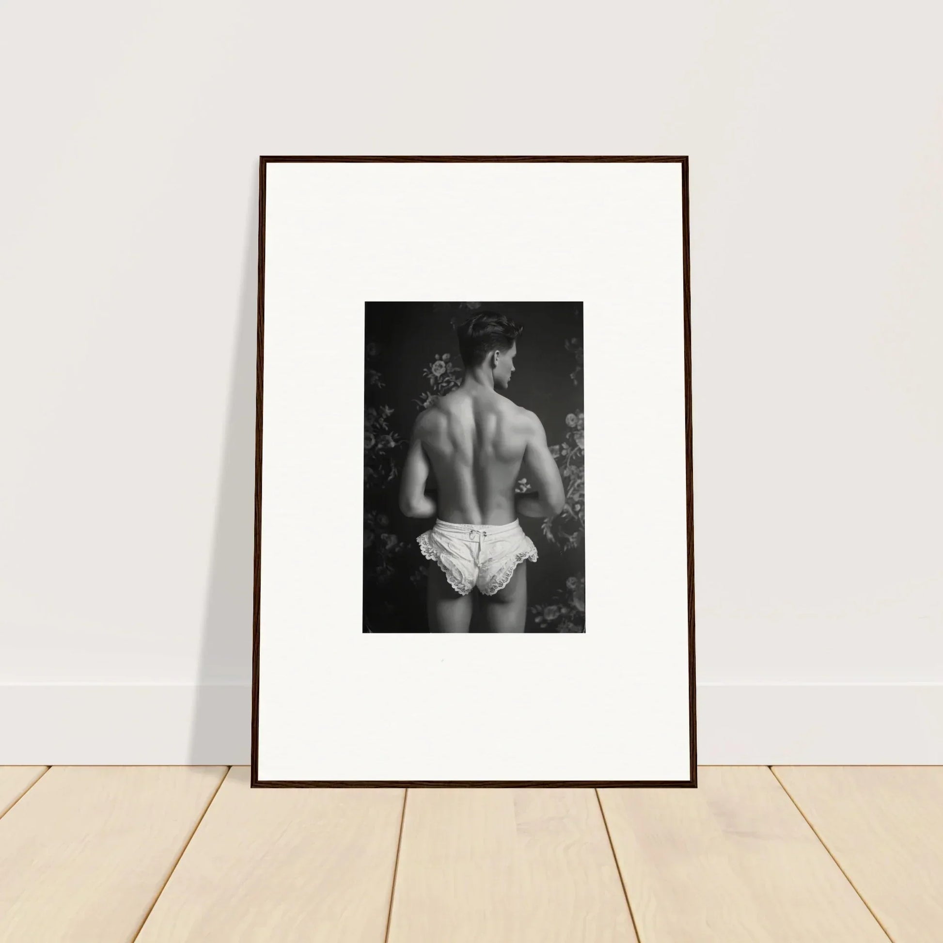 Framed black and white canvas print of a bare back in white underwear for chic wall art