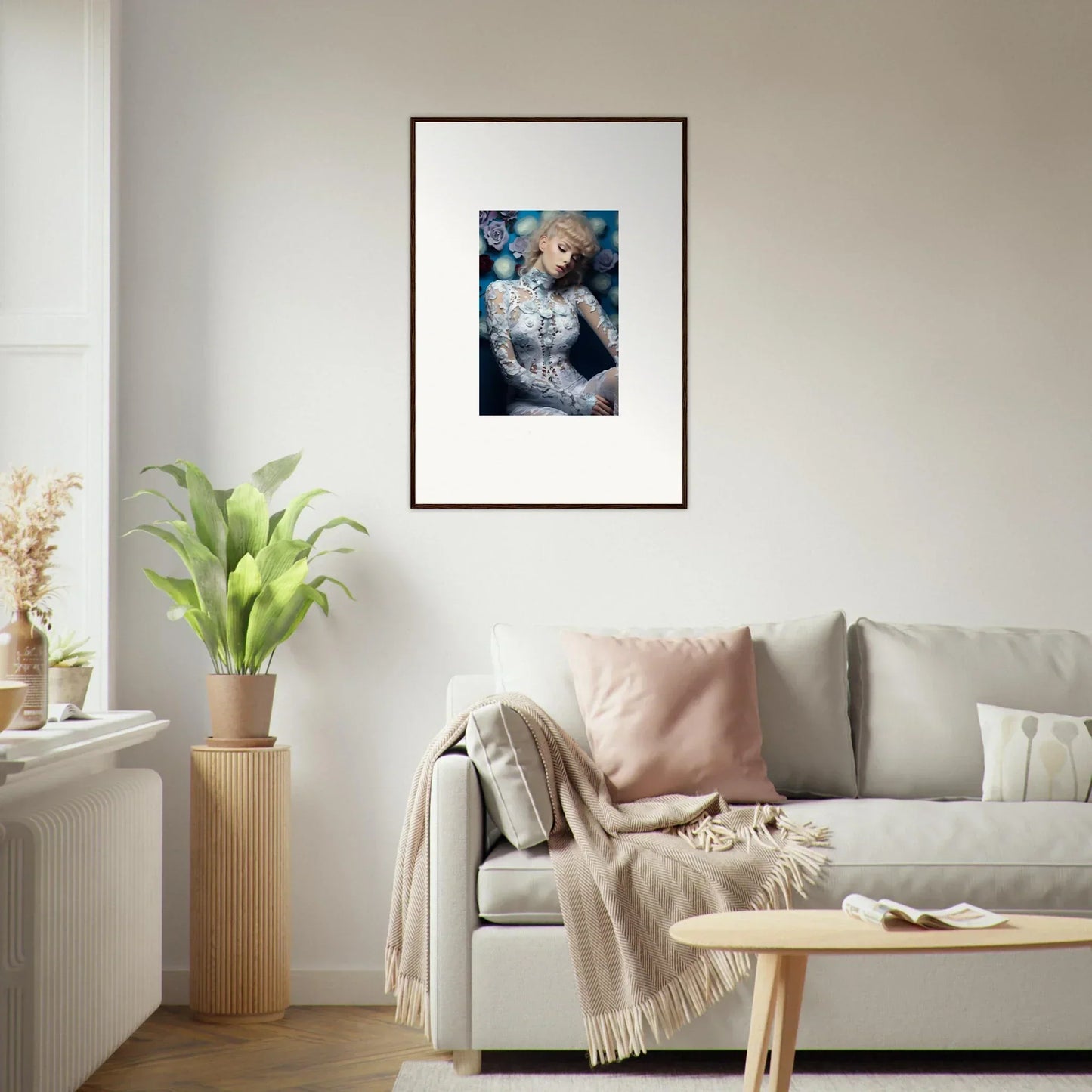 Framed artwork depicting a figure with blonde hair against a blue background.