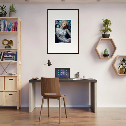 Modern home office workspace with a desk, chair, bookshelf, and decorative wall art.