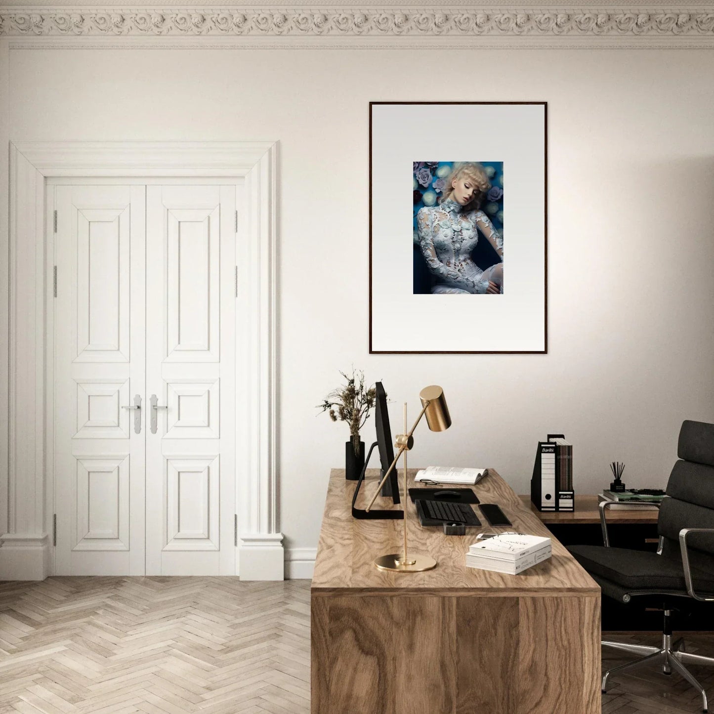 Elegant home office with a wooden desk and framed artwork on the wall.