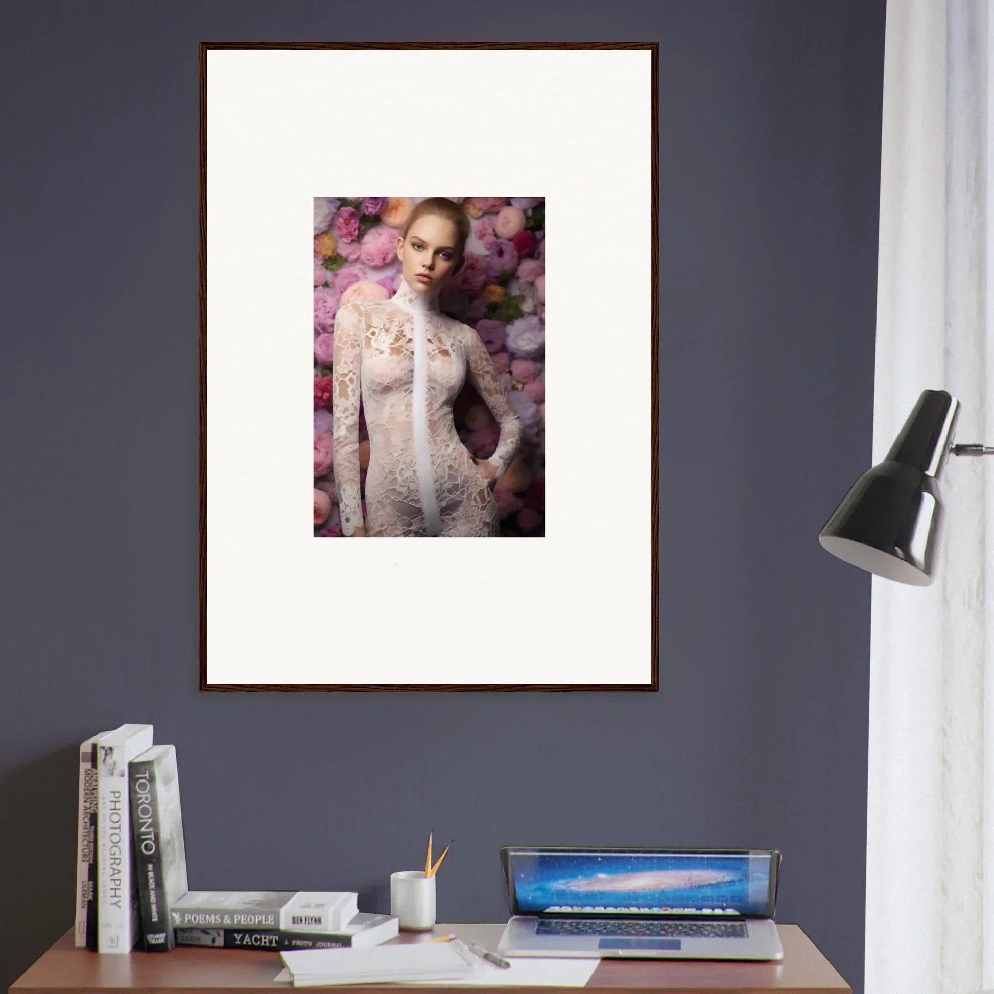 Framed portrait of a woman in a white lace outfit against a floral background.