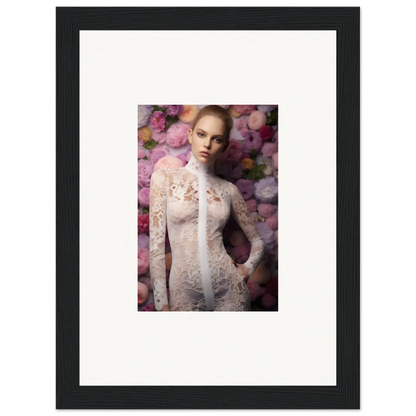 Framed portrait photograph of a woman in a white lace dress against a floral background.