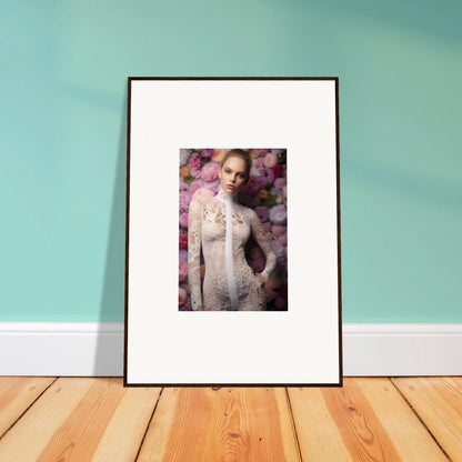 Framed portrait photograph of a woman in a white lace dress surrounded by purple flowers.