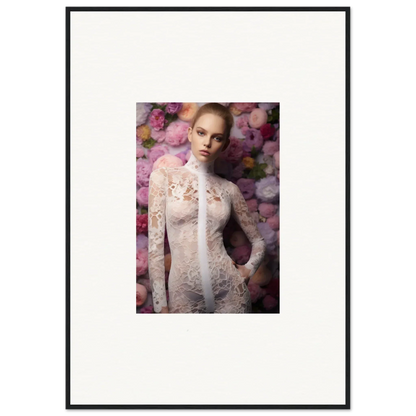 Framed portrait photograph of a woman in a white lace dress against a floral background.