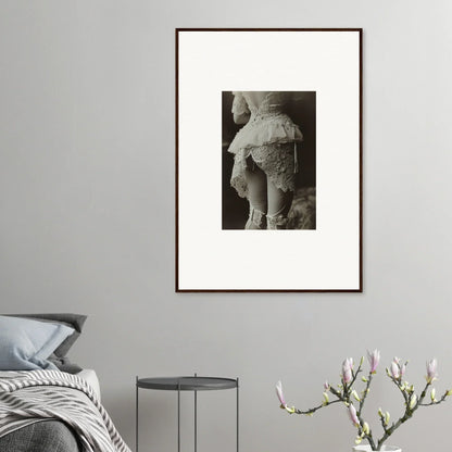 Framed black and white photo of lace garment, perfect for chic room decoration