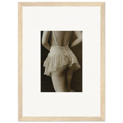 Framed canvas print of a woman in white lace lingerie for chic room decoration