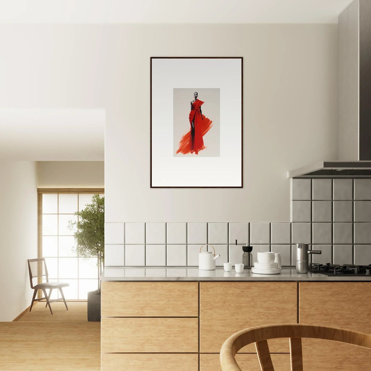 Modern kitchen featuring Lady Crimson Dreaming artwork with a framed red dress