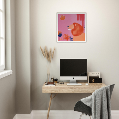 Simple wooden desk featuring an iMac and wall art inspired by Lion’s Psychedelic Serenade