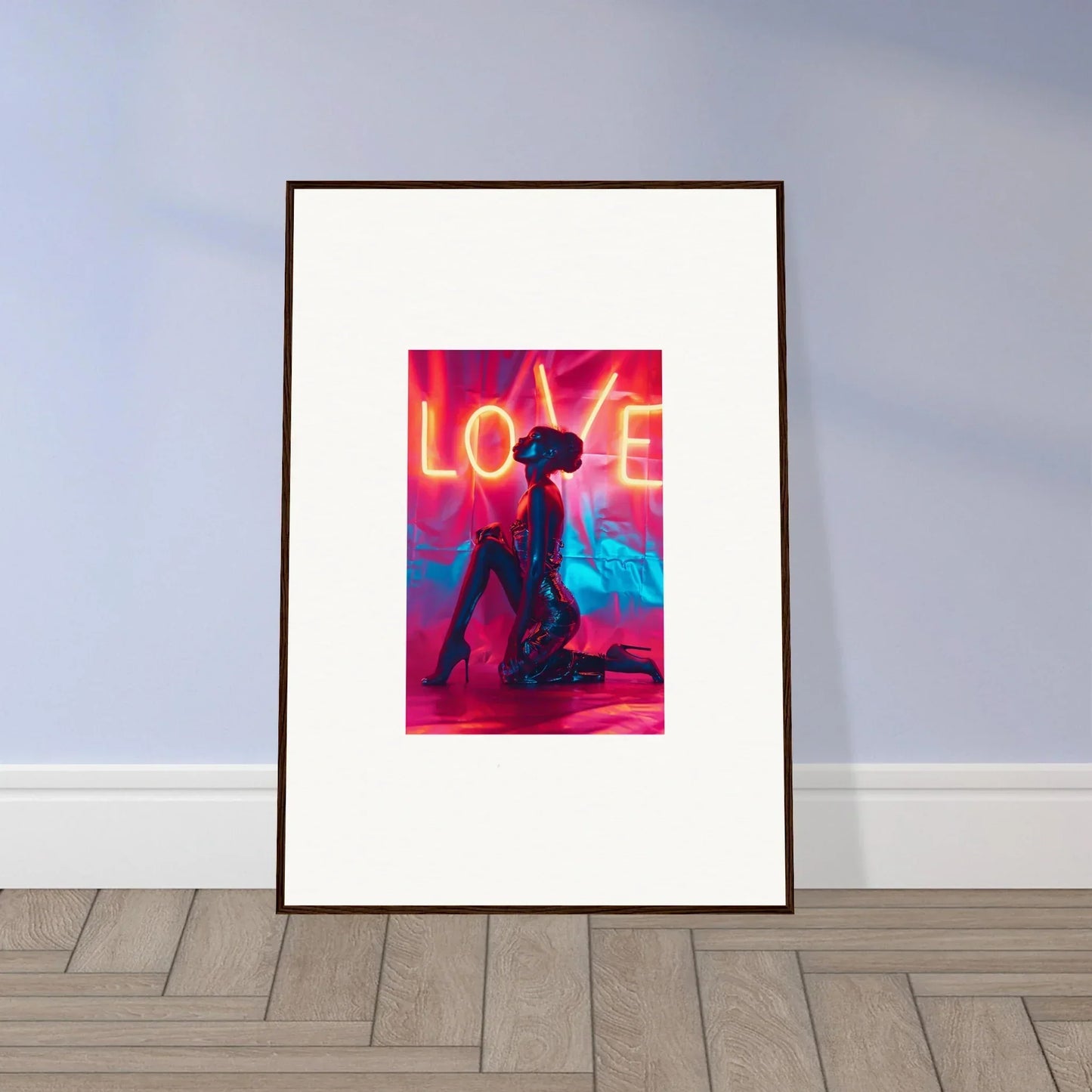 Framed wall art of a silhouetted figure under neon LOVE, perfect for room decoration