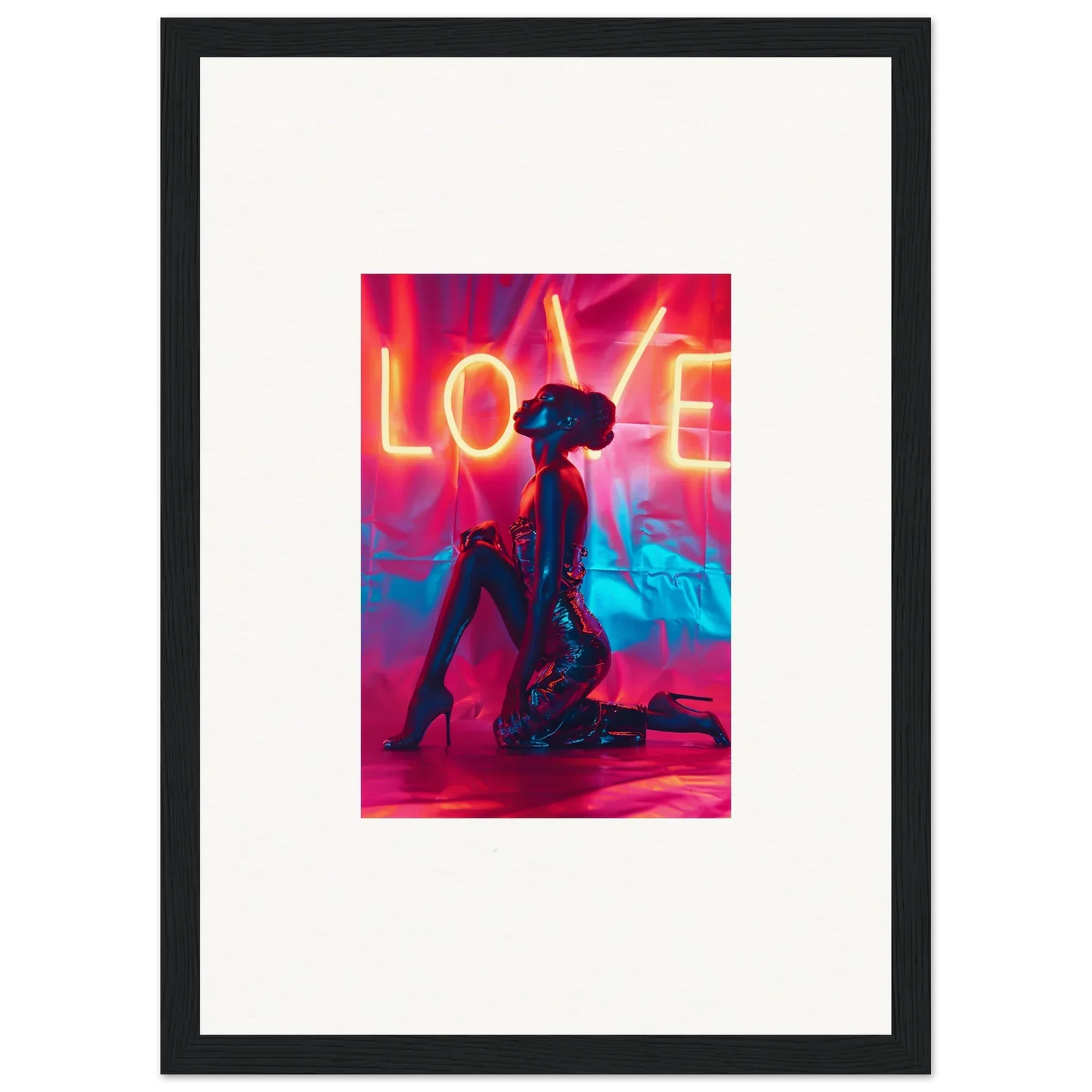 Silhouette of a kneeling figure with a neon LOVE sign, perfect for wall art or room decoration