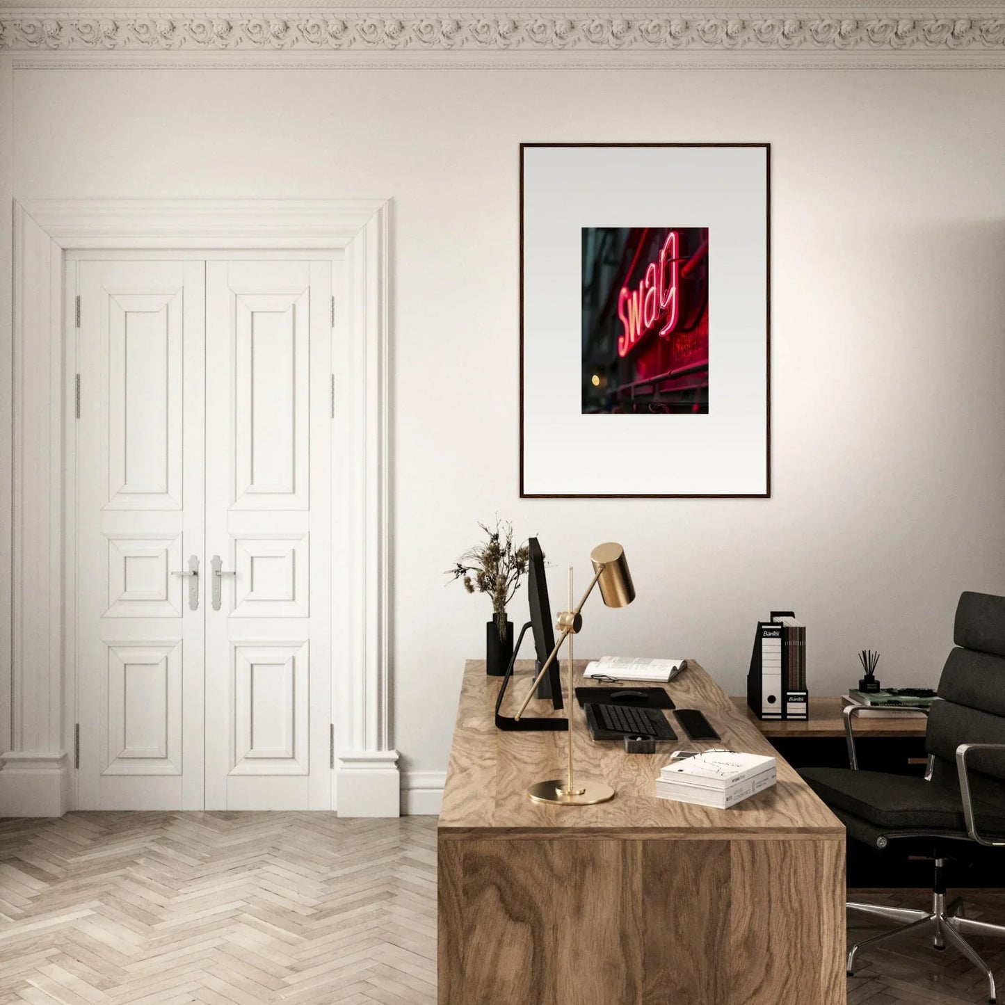 Stylish home office workspace with wooden desk, framed wall art, and night vibrance decor