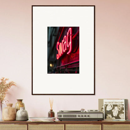 Framed wall art of a glowing red neon Swag sign for vibrant room decor