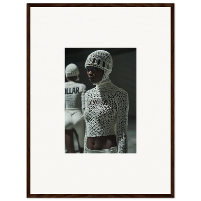 Black and white photograph of a person wearing an intricate crocheted top and hat.