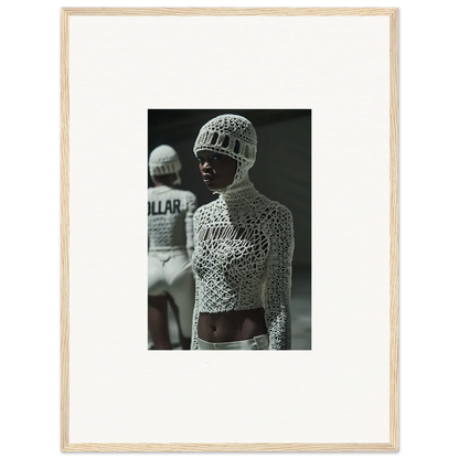 Black and white photograph of a person wearing an intricate crocheted top and hat.