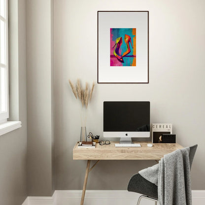 Minimalist home office with a wooden desk, computer, and Enigma Dance canvas print