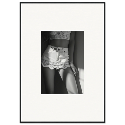 Black and white photograph of a woman’s midsection wearing lacy shorts.