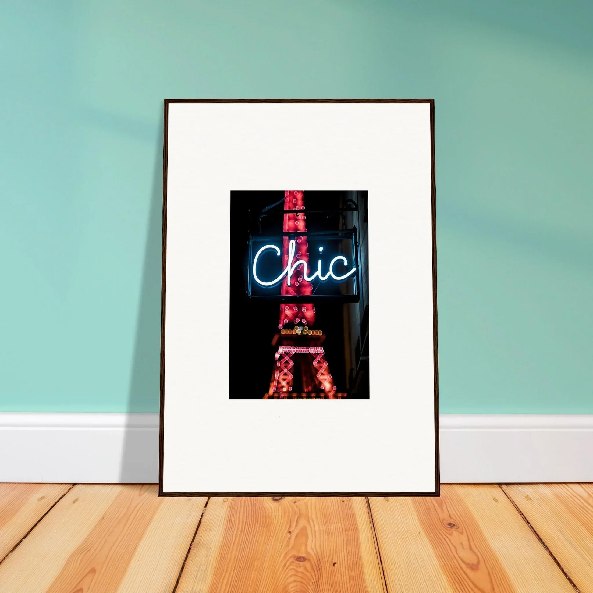 Framed wall art of a neon Chic sign with Eiffel Tower silhouette for Paris dreams decor