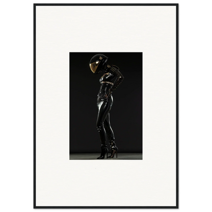 Figure in a shiny black latex or rubber bodysuit and helmet striking a dramatic pose.